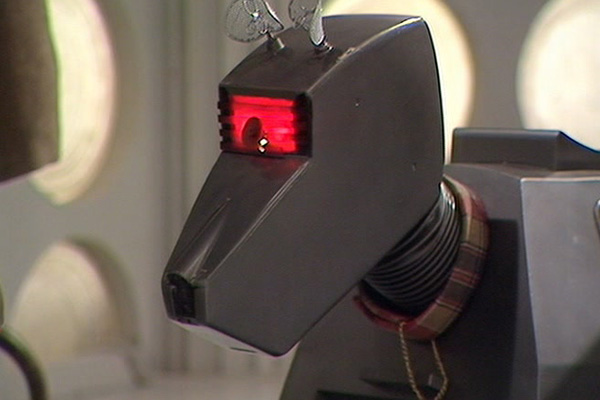K-9 played by John Leeson (Voice) in Doctor Who: State of Decay